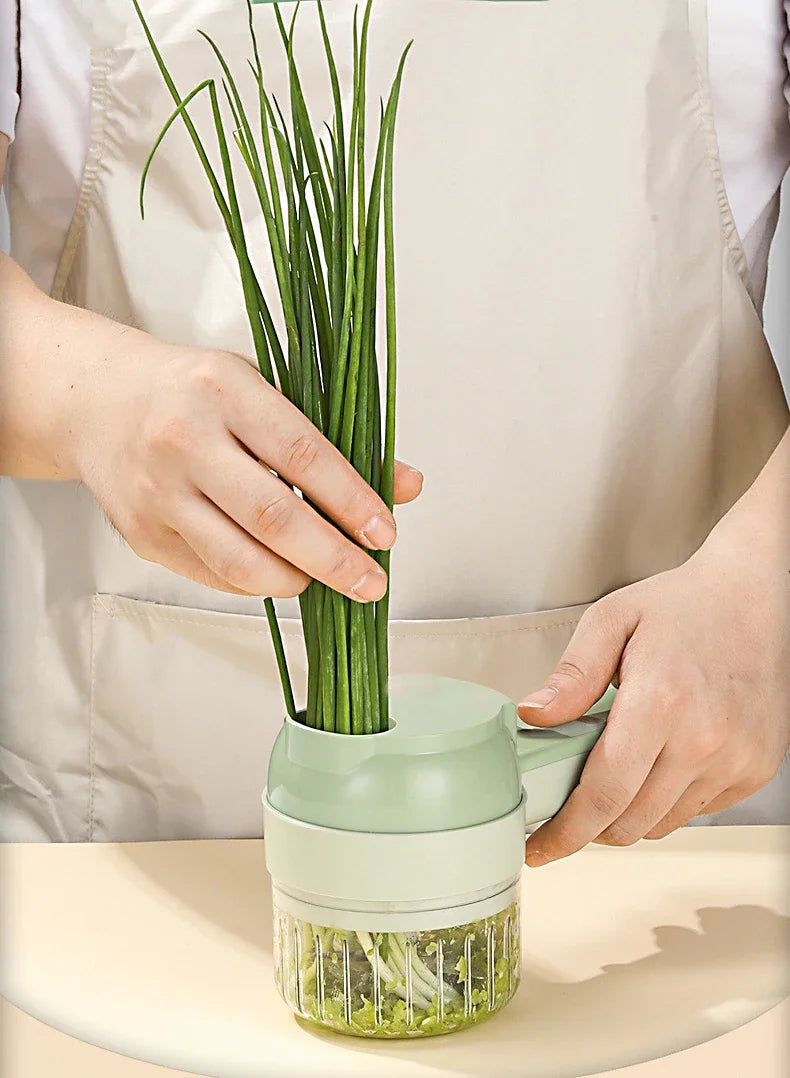 4-in-1 Handheld Electric Vegetable Cutter – Multifunctional Food Chopper, Slicer & Grinder”
